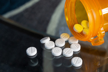 pill bottle and pills