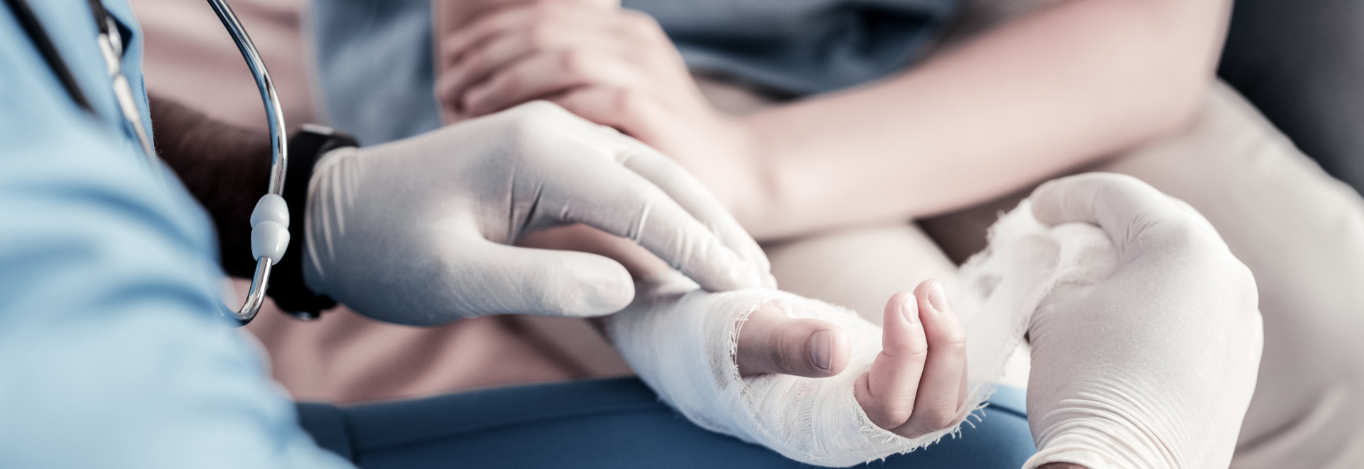 Serious problem Scaled up look on a male doctor putting a bandage on an arm of a child