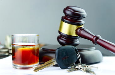 gavel drink and car keys