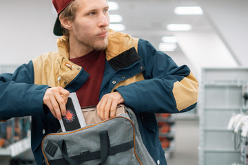 man shoplifting