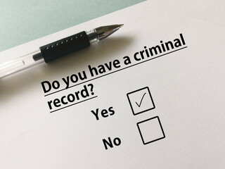 paper that says "do you have a criminal record?"