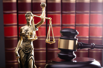 gavel books and lady justice