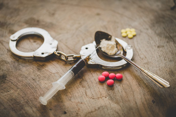handcuffs and drugs