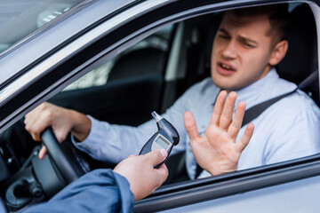 man breathalyzer