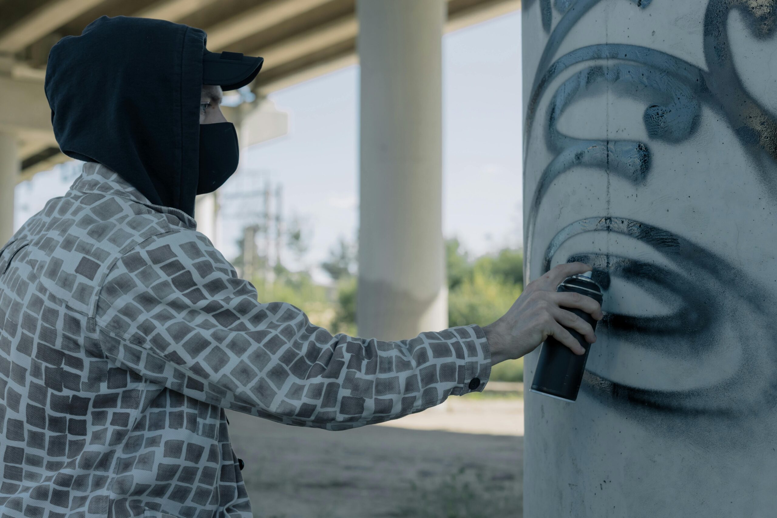 man graffiti vandalism